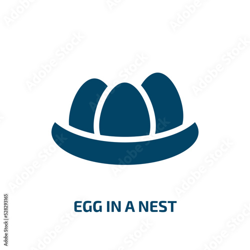 egg in a nest vector icon. egg in a nest, nest, bird filled icons from flat birds pack concept. Isolated black glyph icon, vector illustration symbol element for web design and mobile apps