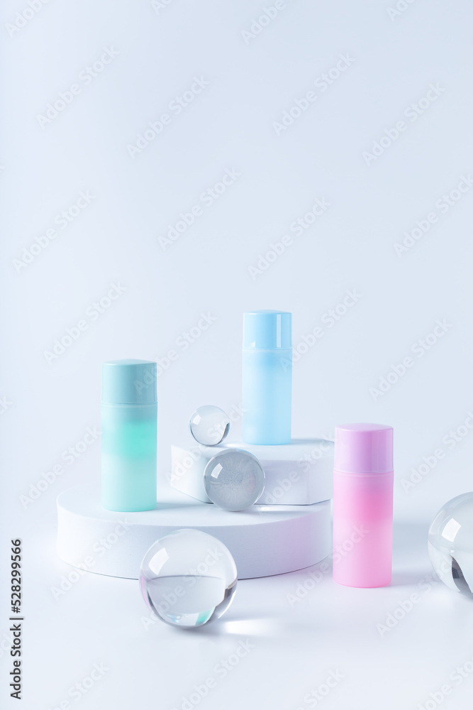 Tubes with cosmetics on podiums