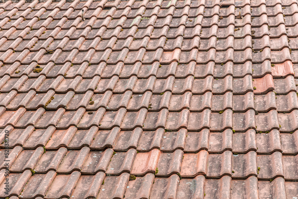 Orange roof tiles of european house, clay tiles texture Orange roof tiles of european house, clay tiles texture
