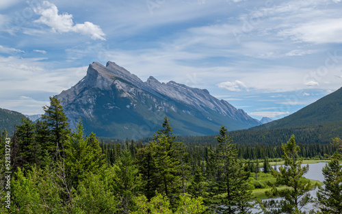 Great Rocky Mountains under magnificent clouds and sunlight, at Banff National Park, Calgary, Canada 