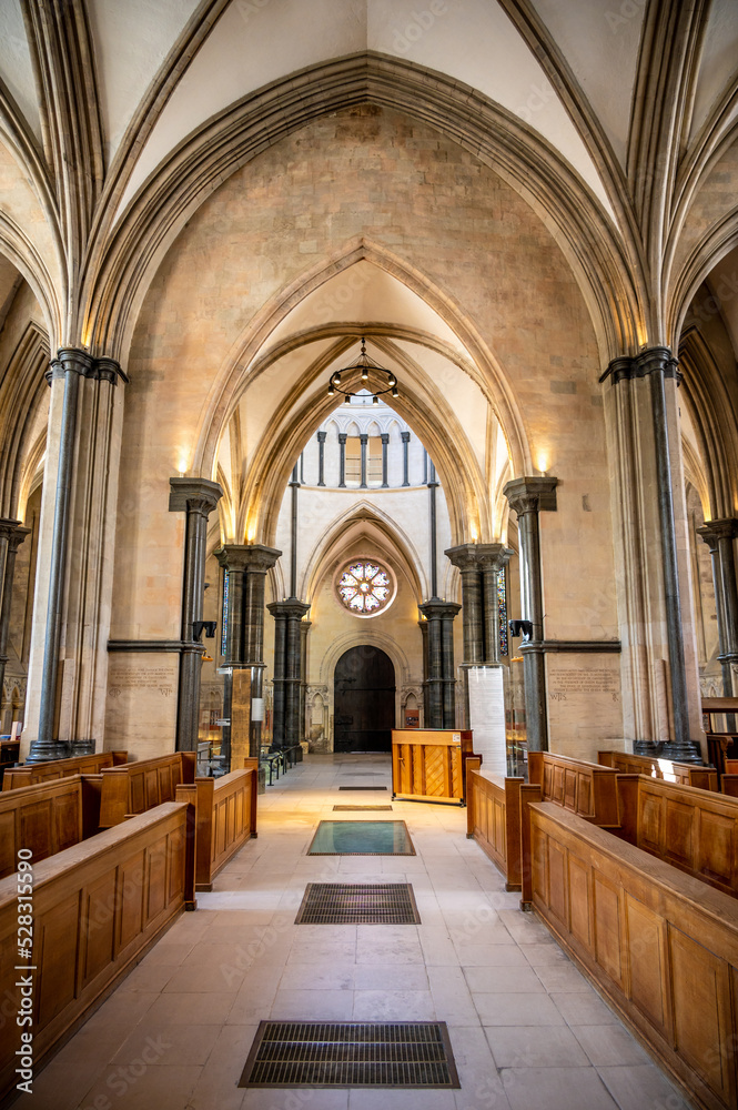 London, UK - August 20, 2022: Impressive Temple Church in the City of London. Temple Church was built by Templars in the 12th century and is a popular destination.