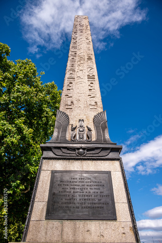Ancient granite Cleopatra's Needle Egyptian obelisk with Egyptian inscriptions on Victoria Embankment in City of Westminster London UK photo