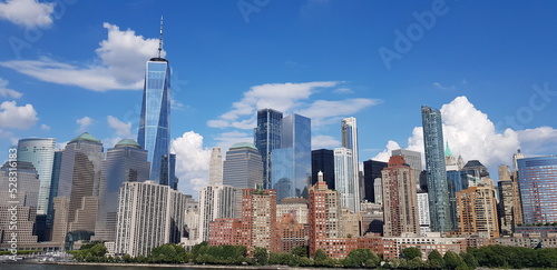 Daytime photos of downtown Manhattan along the Hudson River