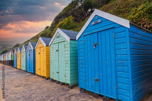 Colourful wooden beach huts at Bournemouth on the South Coast of England UK Europe