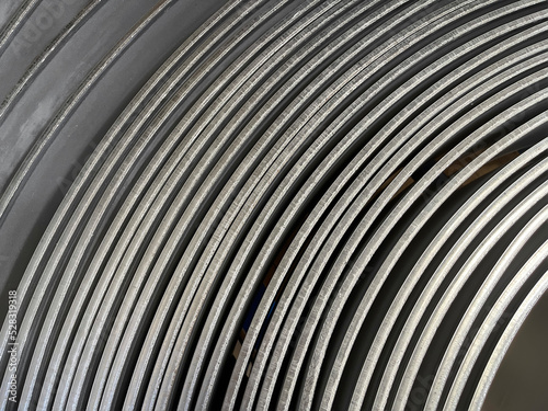details of the edges of a steel coil, steel coil texture for metalworking production, cold stamping, raw material for mass production of parts