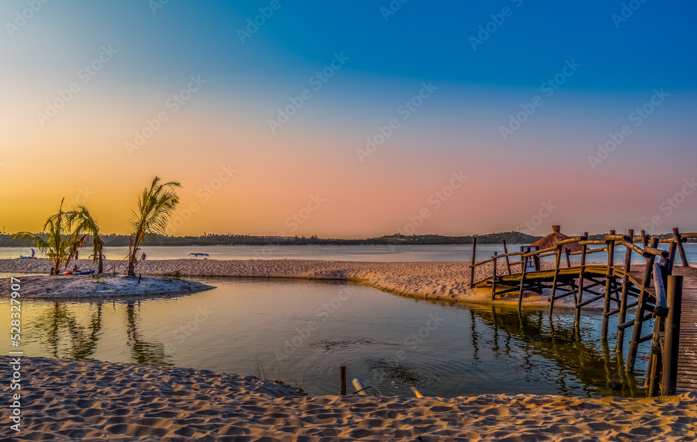 Fototapeta premium Beautiful ,pristine and Turquoise Maputo beach at Bilene with a lagoon and Indian Ocean meeting