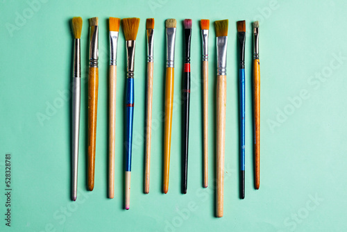 various types, color and size brushes next to each other