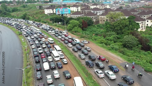 Long queuing, fuel scarcity,driver and vehicles queuing  in lagos Abuja Nigeria. This caused by Nigerian National Petroleum Company Limited (NNPC)