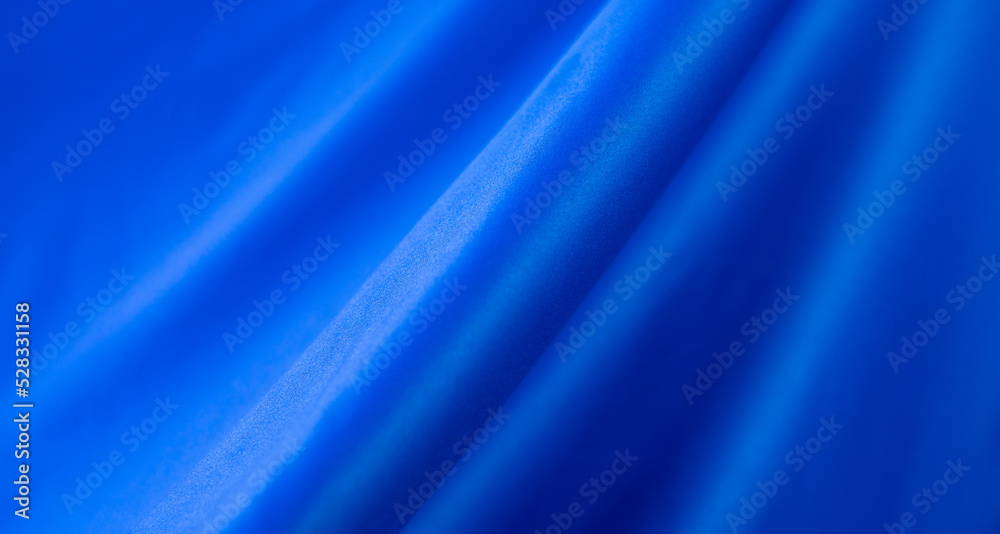 Abstract fabric background for banner. soft silk textile texture in motion for wallpaper Abstract fabric background for banner. soft silk textile texture in motion for wallpaper
