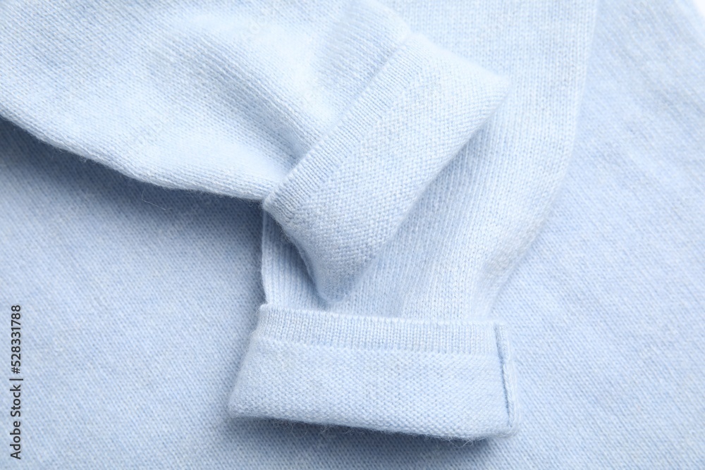 Warm cashmere sweater as background, top view Warm cashmere sweater as background, top view