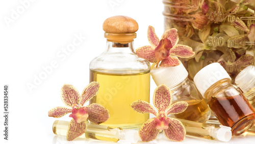 Orchids extracted with alcohol isolated on white background.