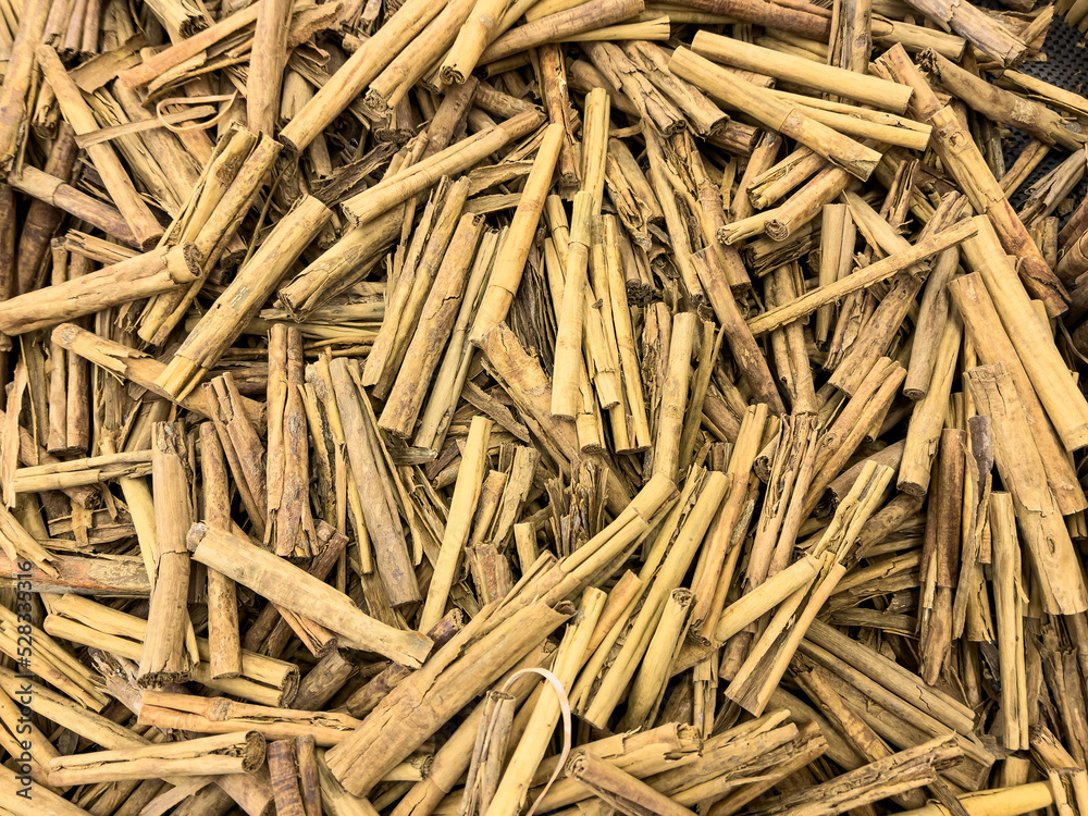 Bulk bunch of cinnamon sticks for sale in a supermarket aisle
Bulk bunch of cinnamon sticks for sale in a supermarket aisle