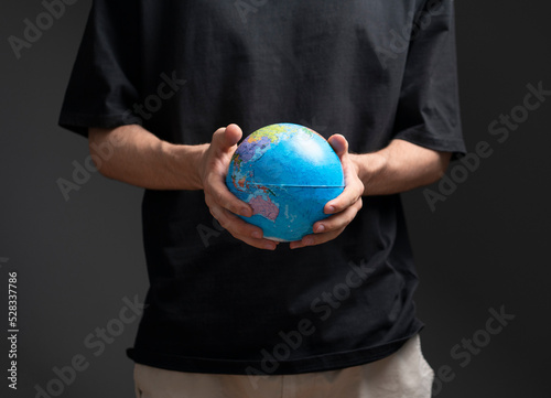 human hands holding the planet earth  global care of environment concept