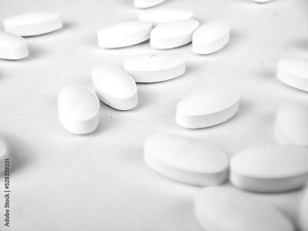 white pills on white background. white medical pills. white pills on white background. white medical pills.