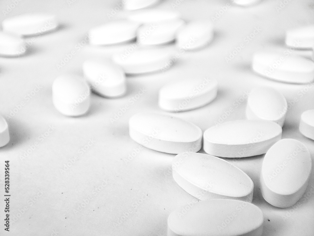 white pills on white background. white medical pills. white pills on white background. white medical pills.