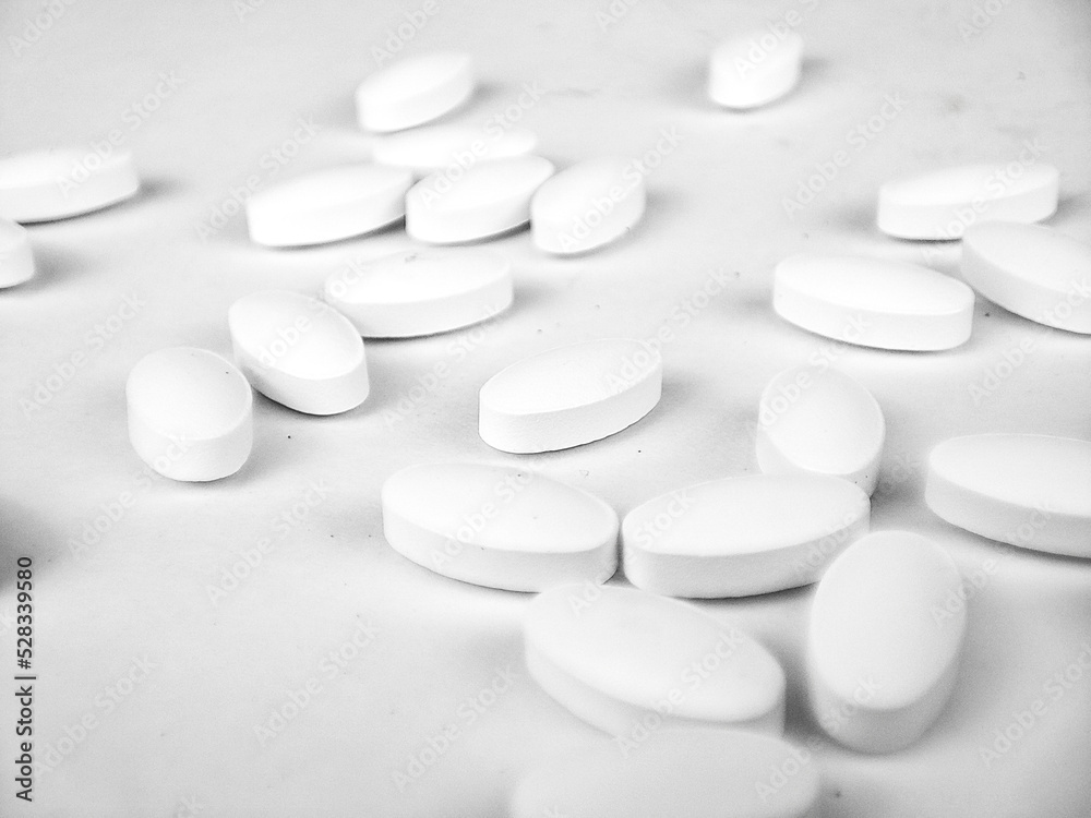 white pills on white background. white medical pills. white pills on white background. white medical pills.