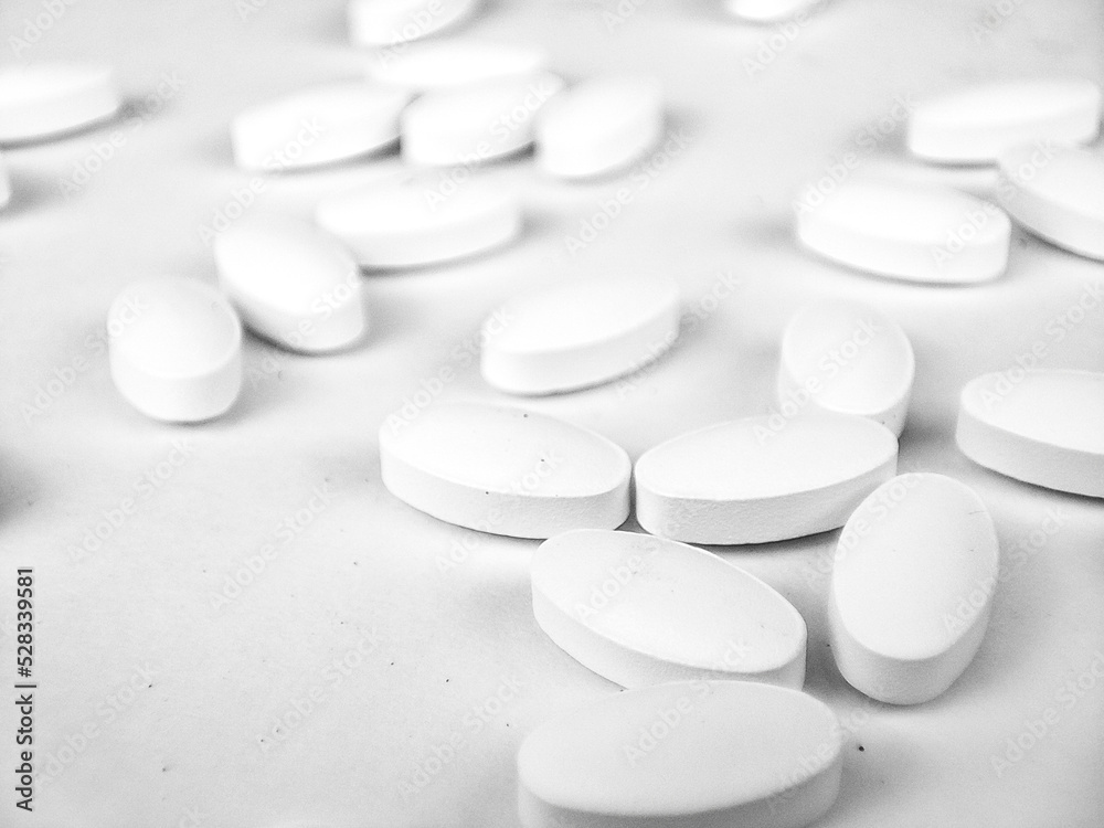 white pills on white background. white medical pills. white pills on white background. white medical pills.