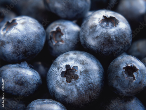 Close-up of blueberries in a low key. Poster. Advertising. Selective focus. Horizontal. Food Background