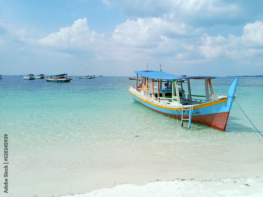 Traditional boat on the beach. Tanjung Kelayang Beach, Belitung Island, Indonesia.