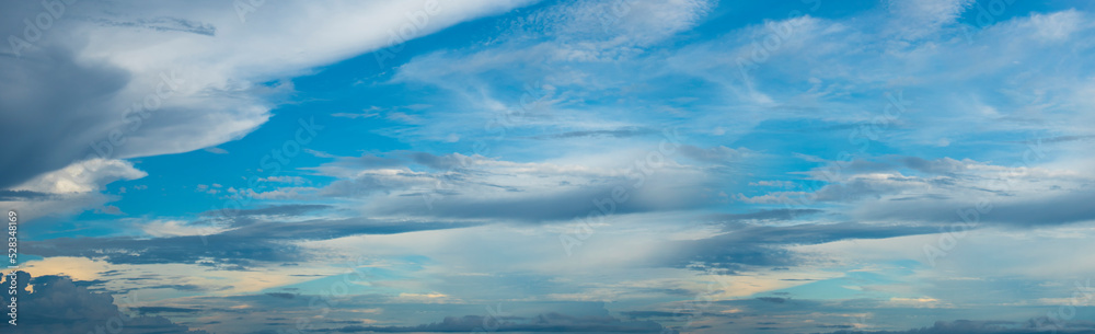 Banner Tropical summer blue sky fluffy white cloud summertime on light sunny day cloudscape. Panoramic Clear bright blue skyline spring sunlight climate background. Heaven blue ecology for web banner Banner Tropical summer blue sky fluffy white cloud summertime on light sunny day cloudscape. Panoramic Clear bright blue skyline spring sunlight climate background. Heaven blue ecology for web banner