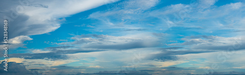 Banner Tropical summer blue sky fluffy white cloud summertime on light sunny day cloudscape. Panoramic Clear bright blue skyline spring sunlight climate background. Heaven blue ecology for web banner