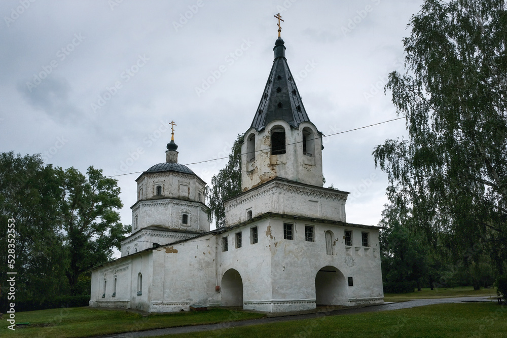 View of Preobrazhenskaya church in Radishchev estate onn cloudy summer day. Radishchevo, Penza Oblast, Russia.