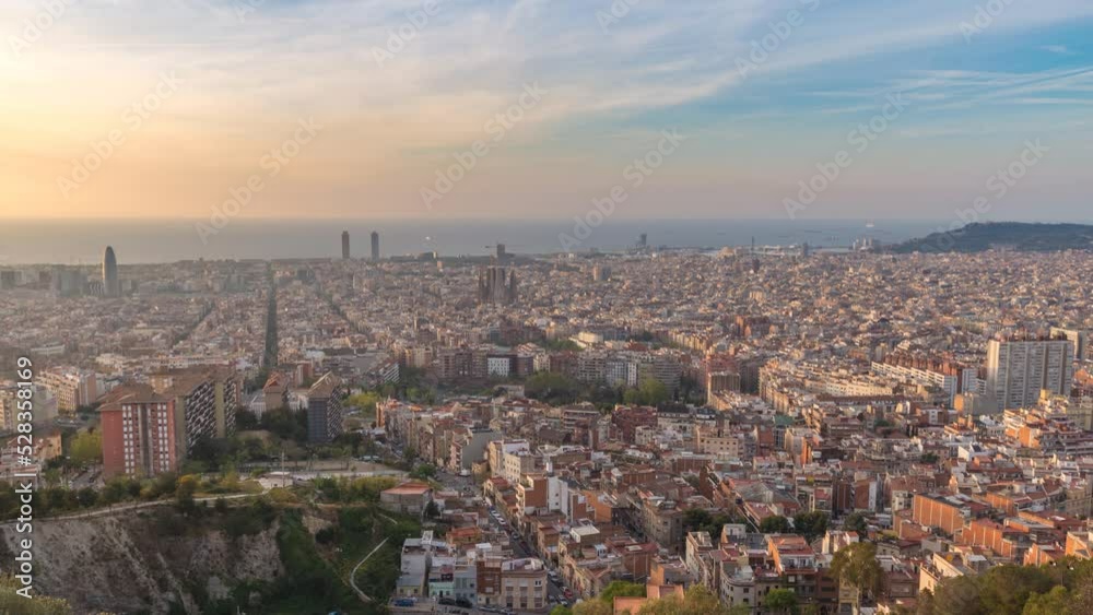 Barcelona Spain time lapse 4K, high angle view city skyline sunrise timelapse from Bunkers del Carmel Barcelona Spain time lapse 4K, high angle view city skyline sunrise timelapse from Bunkers del Carmel