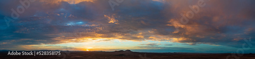 A beautiful clouded sunset over the Mojave desert.  © FroZone