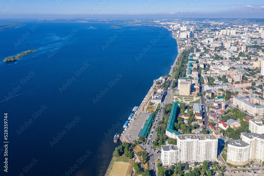 Drone view of Saratov and Volga river embankment on sunny summer day. Saratovskaya Oblast, Russia.