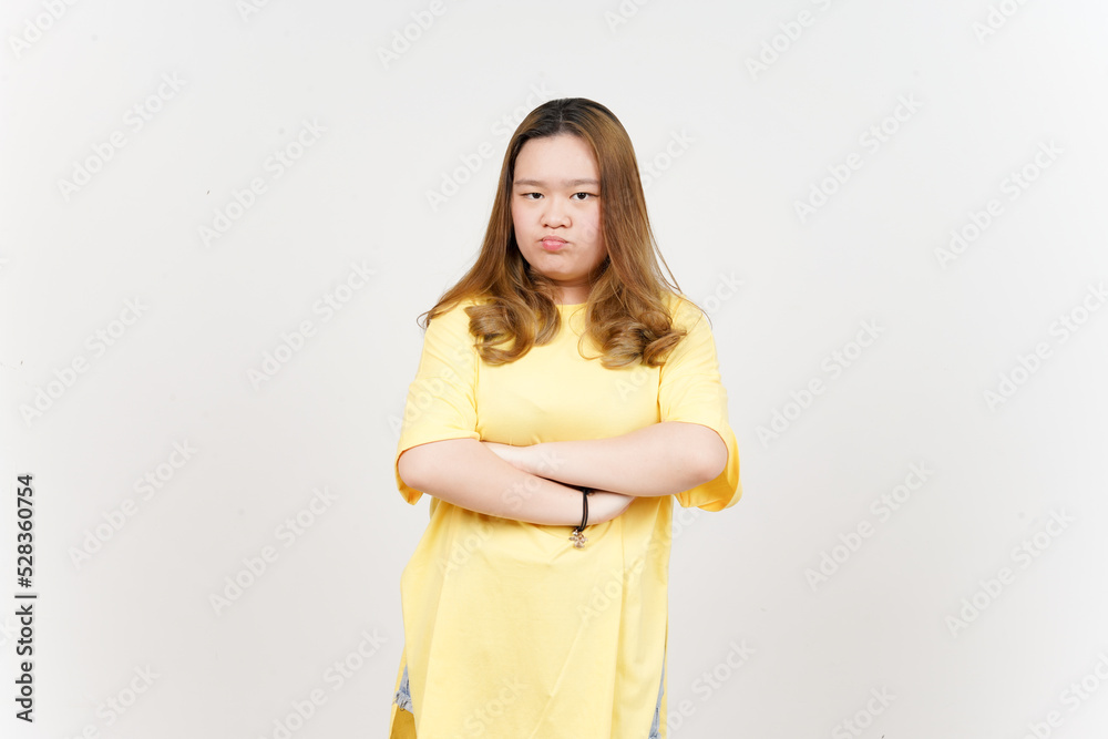 Angry Face Expression of Beautiful Asian Woman wearing yellow T-Shirt Isolated On White Background Angry Face Expression of Beautiful Asian Woman wearing yellow T-Shirt Isolated On White Background