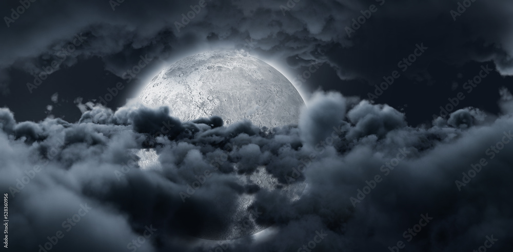 Fototapeta premium Shining moon hide by dark grey clouds in the sky 