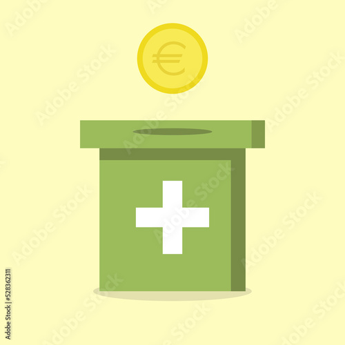 Eine grüne Spendenbox mit einem weißen Kreuz drauf und oben ist eine Münze abgebildet.