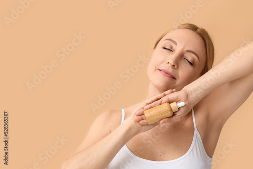 Mature woman with cosmetic ...