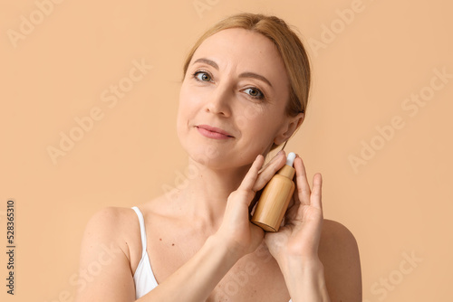 Mature woman with cosmetic ...