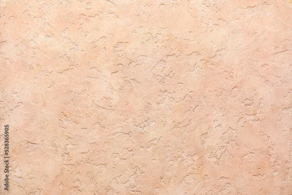 Beige concrete wall as background, closeup