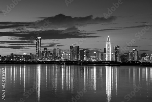 Skyline of Shenzhen city, China at dusk. Viewed from Hong Kong border Lau Fau Shan