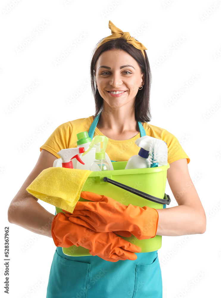 Beautiful woman holding bucket with cleaning supplies on white background Beautiful woman holding bucket with cleaning supplies on white background