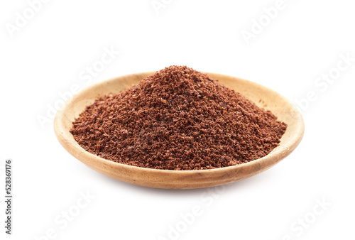 cocoa or cacao powder in wood plate isolated on white background. heap of cocoa seed or cacao powder in wood bowl isolated on white background