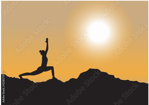 silhouette of a yoga girl in the mountains