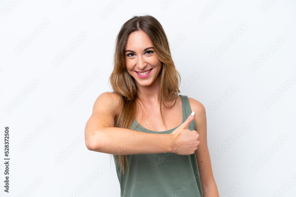 Young caucasian woman isolated on white background giving a thumbs up gesture Young caucasian woman isolated on white background giving a thumbs up gesture