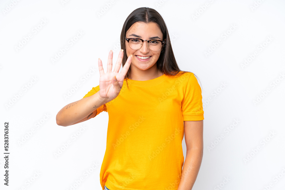 Young caucasian woman isolated on white background happy and counting four with fingers Young caucasian woman isolated on white background happy and counting four with fingers