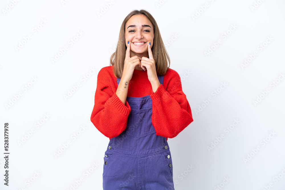 Young caucasian woman isolated on white background smiling with a happy and pleasant expression Young caucasian woman isolated on white background smiling with a happy and pleasant expression