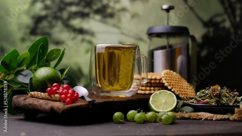  Tea, waffles and brown sugar. Close-up 4k video shooting, dark background.