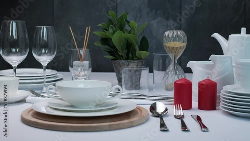 Buffet Table Setting , white plate fork and knife.