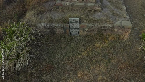 Aerial drone footage of an old gravestone in Rawat Fort in Rawat, Pakistan photo