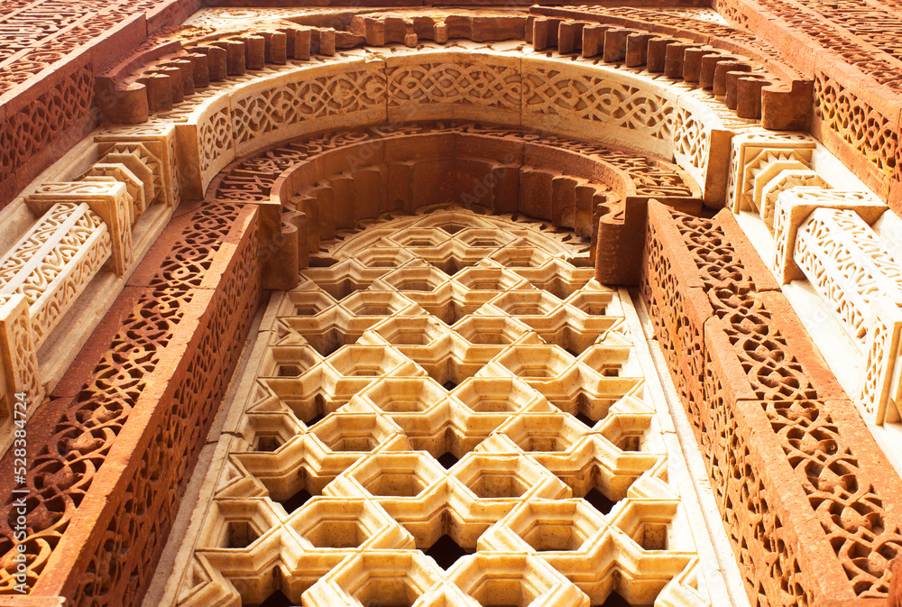 Wall art sculpture in Qutub Minar. Sculpture mural on Sandstone in
