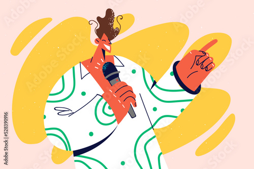 Smiling man making presentation with mic