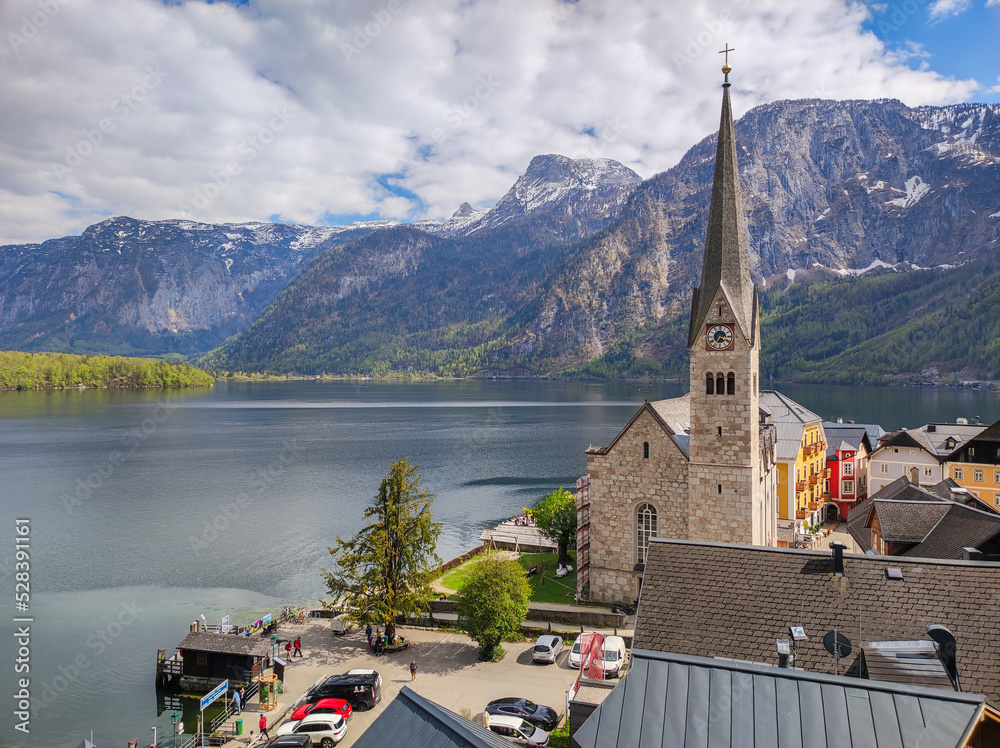 A beautiful view of the village of Hallstatt near Lake Hallstätter. Mountains Alps Upper Austria. Evangelische Kirche