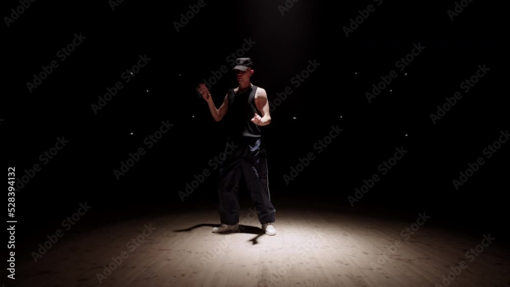 professional choreographer and dancer man is dancing on scene or in rehearsal room professional choreographer and dancer man is dancing on scene or in rehearsal room