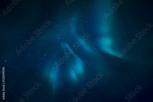 Fotografiet Under  shot of polar light Polar lights in the sky with stars